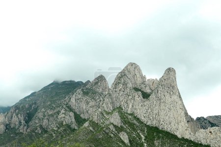 Photo for Picturesque landscape with high mountains under gloomy sky - Royalty Free Image