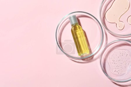 Photo for Many Petri dishes and cosmetic products on pink background, flat lay. Space for text - Royalty Free Image