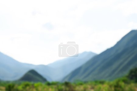 Photo for Blurred view of high mountains under sky outdoors - Royalty Free Image