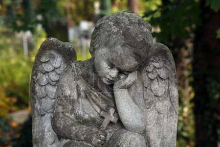 Beautiful statue of angel outdoors, closeup. Funeral ceremony