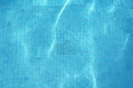 Photo for Empty swimming pool with clear water, top view - Royalty Free Image