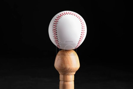 Photo for Baseball bat and ball on black background. Sports equipment - Royalty Free Image