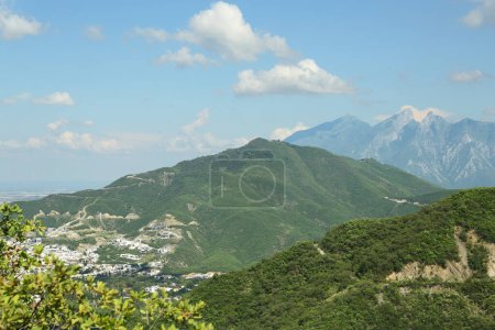 Photo for Picturesque view of big mountains and trees under cloudy sky - Royalty Free Image