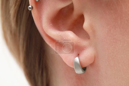 Photo for Woman with dry skin on white background, closeup of ear - Royalty Free Image