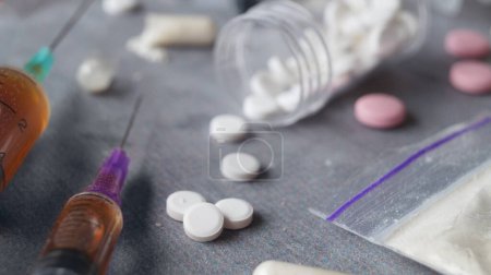 Photo for Different hard drugs on grey table, closeup - Royalty Free Image