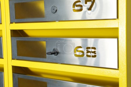 Photo for New metal mailbox with key and numbers, closeup - Royalty Free Image