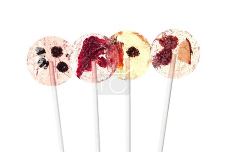 Photo for Sweet colorful lollipops with berries on white background - Royalty Free Image