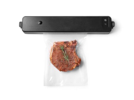 Sealer for vacuum packing and plastic bag with tasty meat isolated on white, top view