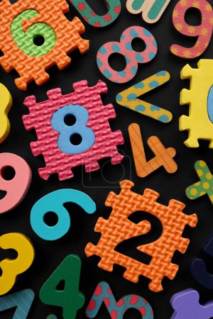 Photo for Many colorful numbers and mathematical symbols on black background, flat lay - Royalty Free Image