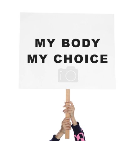 Foto de Woman holding placard with phrase My Body My Choice on white background, closeup. Abortion protest - Imagen libre de derechos