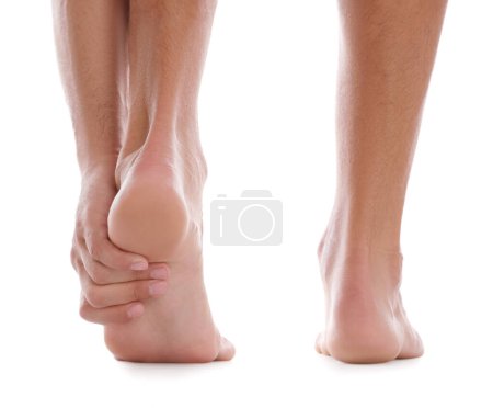 Photo for Back view of man suffering from foot pain on white background, closeup - Royalty Free Image