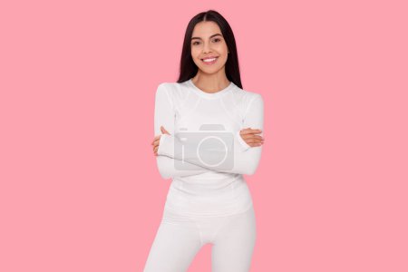 Téléchargez les photos : Woman in warm thermal underwear on pink background - en image libre de droit