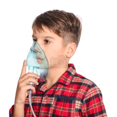Téléchargez les photos : Boy using nebulizer for inhalation on white background - en image libre de droit