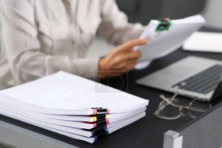 Photo for Businesswoman working at table in office, focus on documents. Space for text - Royalty Free Image
