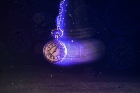 Foto de Hypnosis session. Vintage pocket watch with chain swinging over surface on dark background among faded clock faces, magic motion effect - Imagen libre de derechos