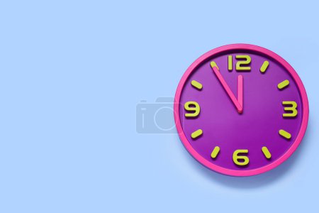 Photo for Clock showing five minutes until midnight on light blue background, top view with space for text. New Year countdown - Royalty Free Image