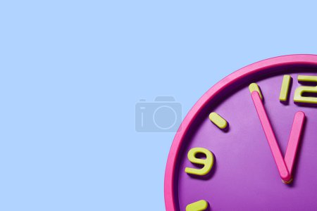 Photo for Clock showing five minutes until midnight on light blue background, top view with space for text. New Year countdown - Royalty Free Image