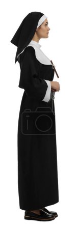 Téléchargez les photos : Young nun wearing cassock on white background - en image libre de droit