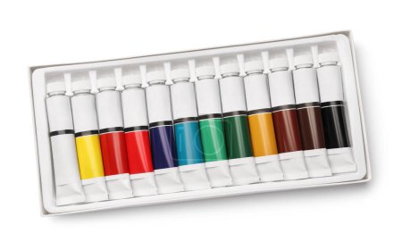 Téléchargez les photos : Ensemble de peintures à l'huile colorées dans des tubes sur fond blanc, vue de dessus - en image libre de droit