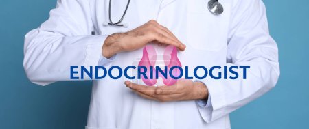 Endocrinologist holding thyroid illustration on light blue background, closeup. Banner design