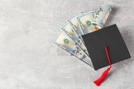 Photo for Scholarship concept. Graduation cap and banknotes on light grey table, flat lay with space for text - Royalty Free Image