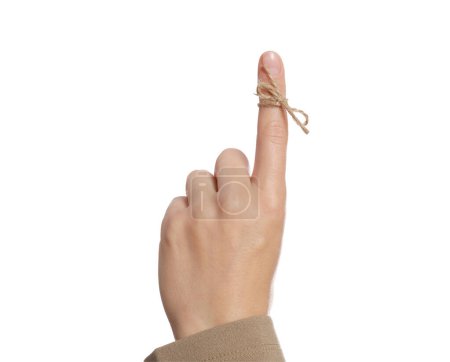 Photo for Woman showing index finger with tied bow as reminder on white background, closeup - Royalty Free Image