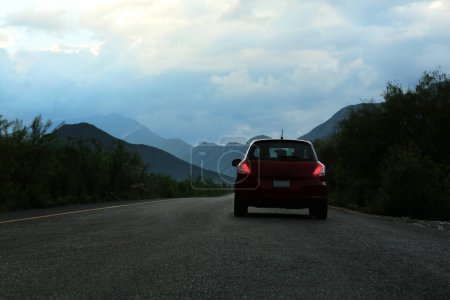 Photo for Beautiful view of car on asphalt highway in mountains. Road trip - Royalty Free Image