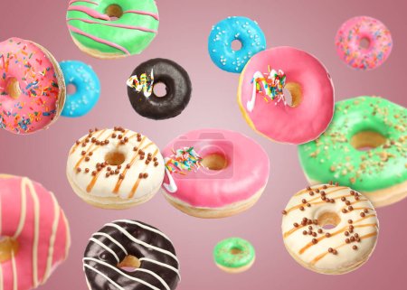Many sweet tasty donuts falling on pink background