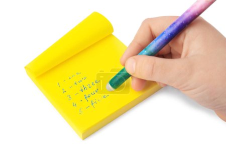 Photo for Child erasing word Five written with erasable pen on sticky note against white background, closeup - Royalty Free Image