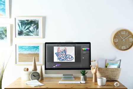 Téléchargez les photos : Animator's workplace. Modern computer with illustration on screen - en image libre de droit