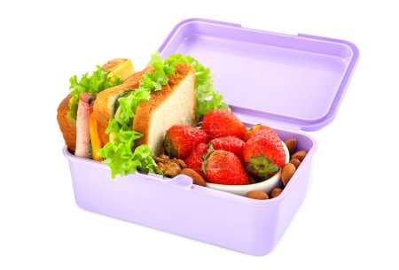 Foto de Caja de almuerzo con alimentos saludables para escolares aislados en blanco - Imagen libre de derechos