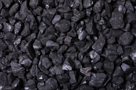 Foto de Trozos de carbón negro como fondo, vista superior - Imagen libre de derechos