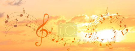 Photo for Treble clef and swirly staff with musical notes against sunset sky, banner design - Royalty Free Image