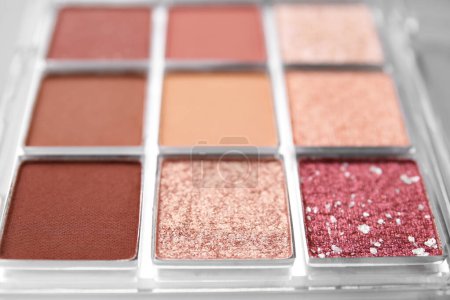 Photo for Beautiful eyeshadow palette as background, closeup. Professional cosmetic product - Royalty Free Image
