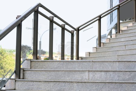 Photo for Stairs with metal handrailing outdoors on sunny day - Royalty Free Image