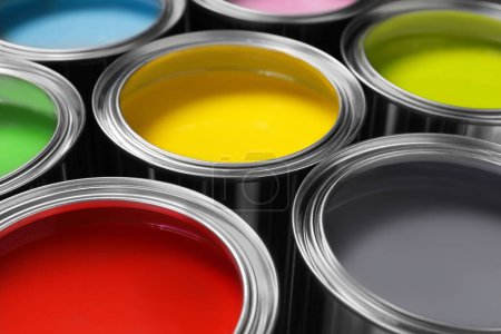 Photo for Open cans of different paints as background, closeup - Royalty Free Image