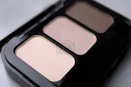 Photo for Beautiful eyeshadow palette on light gray background, closeup. Professional cosmetic product - Royalty Free Image