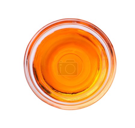 Téléchargez les photos : Bol en verre avec colorant alimentaire orange isolé sur blanc, vue de dessus - en image libre de droit