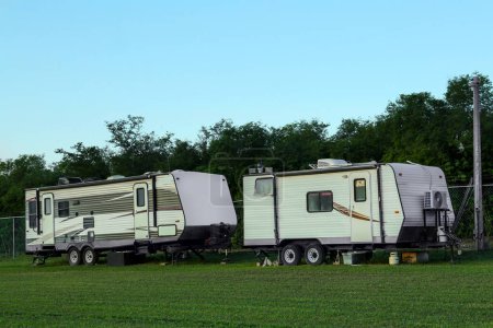 Travel trailers parked outdoors. Home on wheels