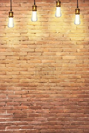 Many pendant lamps against old brick wall Poster 649881172