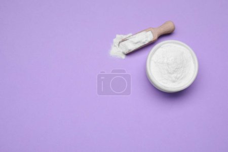 Photo for Sweet powdered fructose on violet background, flat lay. Space for text - Royalty Free Image