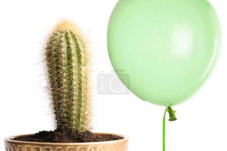 Photo for Green balloon near cactus on white background - Royalty Free Image