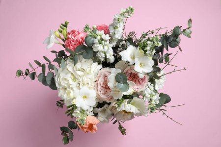 Photo for Bouquet of beautiful flowers on pink background, top view - Royalty Free Image