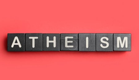Photo for Word Atheism made of black wooden cubes with letters on red textured table, top view - Royalty Free Image