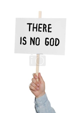 Photo for Atheism. Man holding sign with text There Is No God on white background, closeup - Royalty Free Image