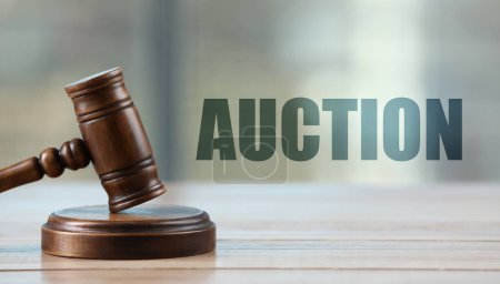 Photo for Auction. Gavel on white wooden table indoors - Royalty Free Image