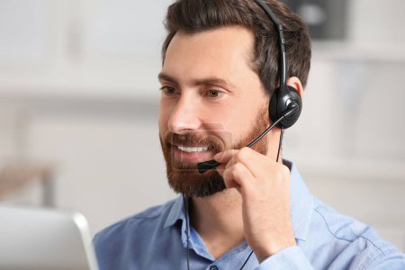 Hotline operator with headset working in office, space for text