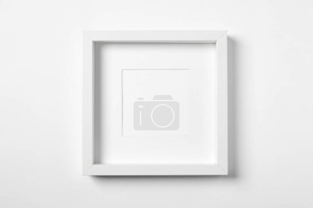 Empty frame on white background. Mockup for design