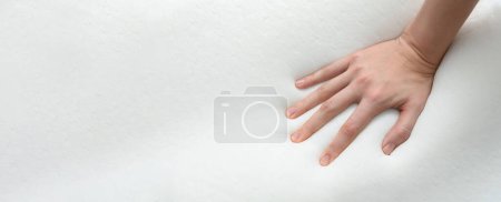 Photo for Woman touching memory foam pillow, closeup. Banner design with space for text - Royalty Free Image