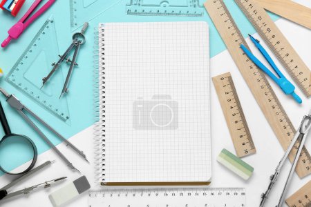 Photo for Flat lay composition with different rulers and notebook on color background - Royalty Free Image